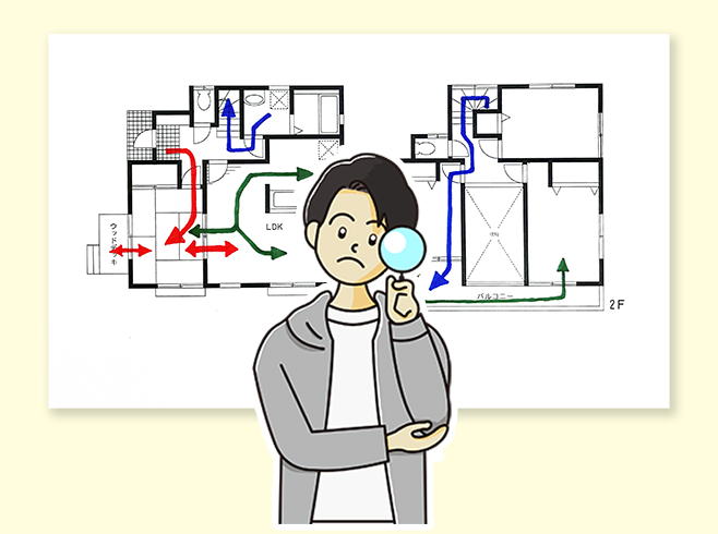 間取り図から家具の配置や生活導線を考えている男性のイラスト